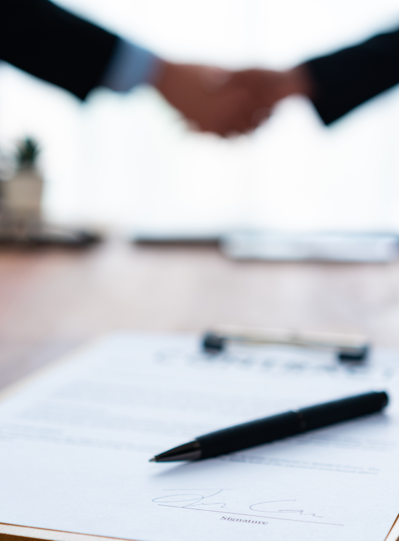 business people group joining hands and stay as team in circle and representing concept of friendship and teamwork<br />
